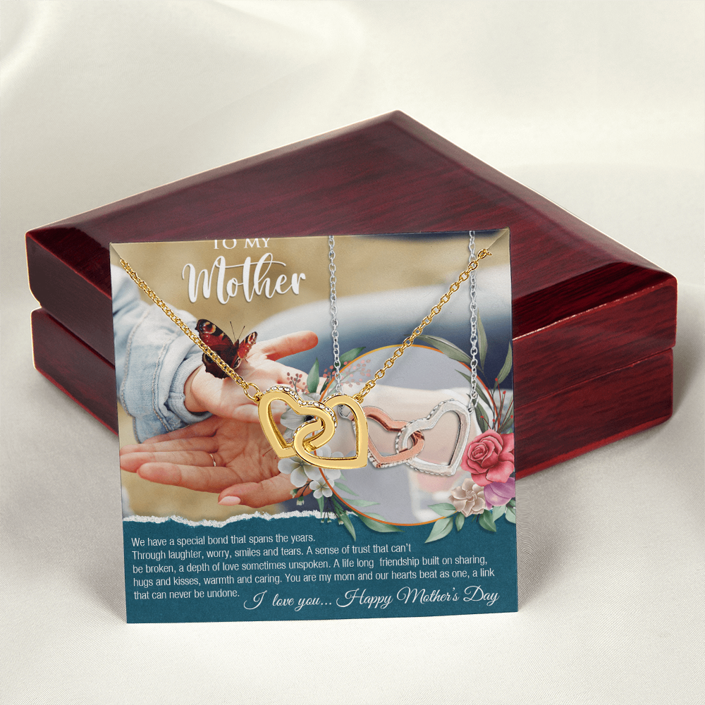 Forever Connected: Interlocking Heart Necklace with a Heartfelt Message for Mom