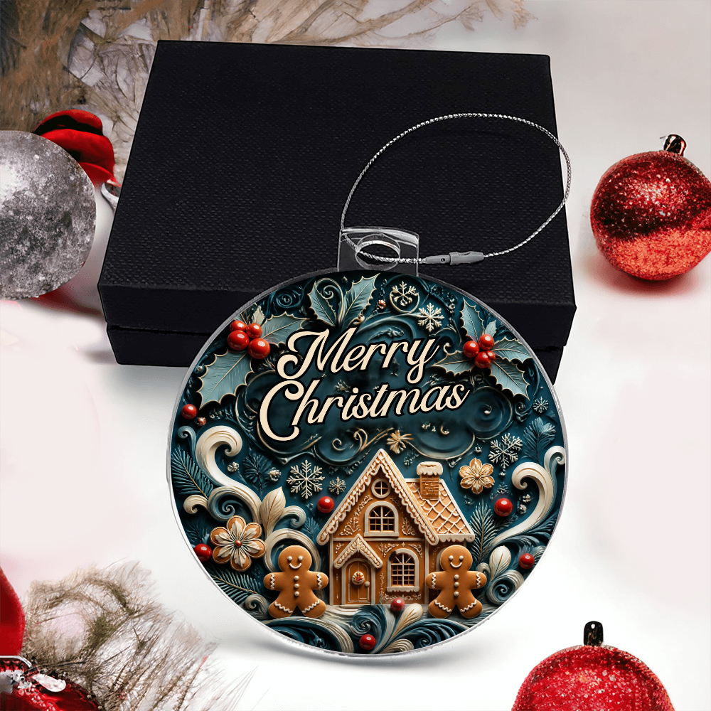 Round gingerbread acrylic Christmas ornament featuring "Merry Christmas" text, displayed next to a black gift box.