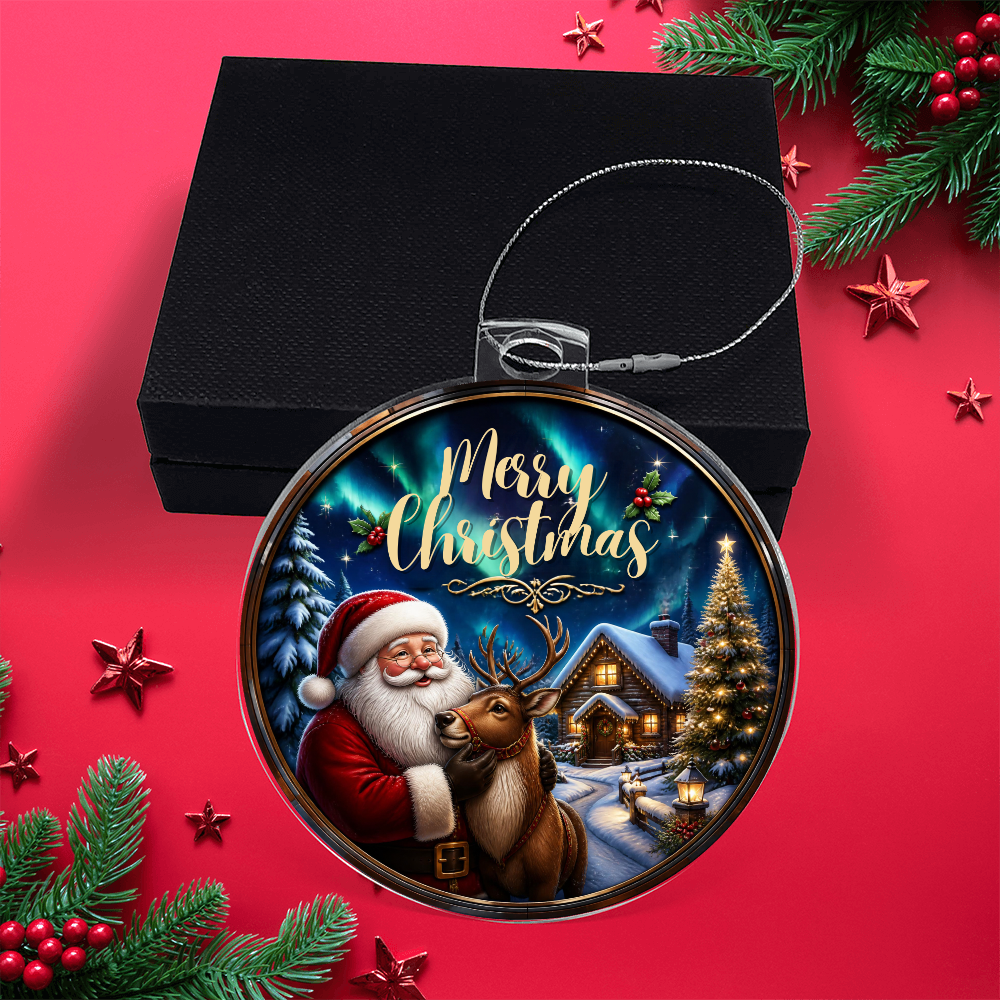 Round acrylic Christmas ornament in a stained-glass style featuring Santa Claus and a reindeer set against a vibrant red background with festive holiday decorations and a black gift box.