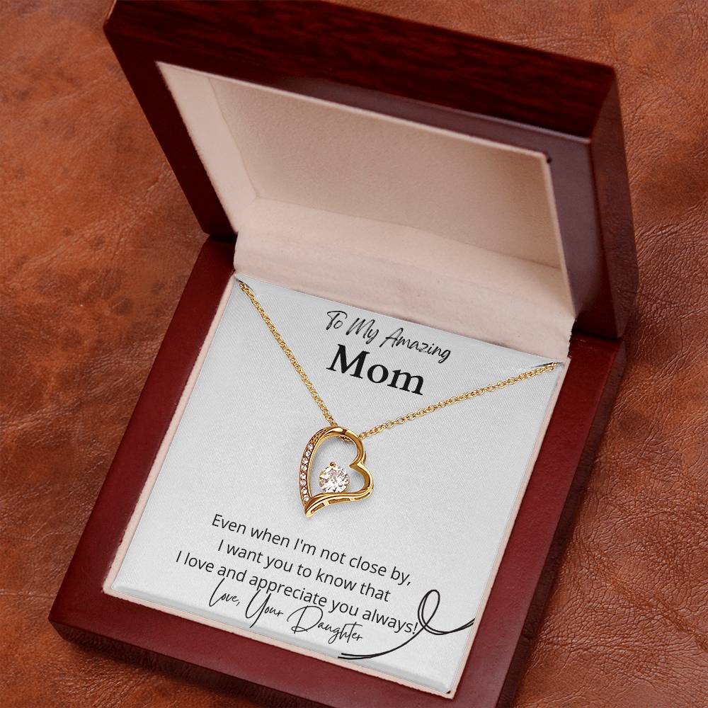 Emotional mother-daughter jewelry  Expressive love-themed necklace  Unique mom's keepsake  Cherished gift from daughter  Timeless love adornment  Mom's special pendant  Daughter's affectionate gift  Personalized mom's jewelry