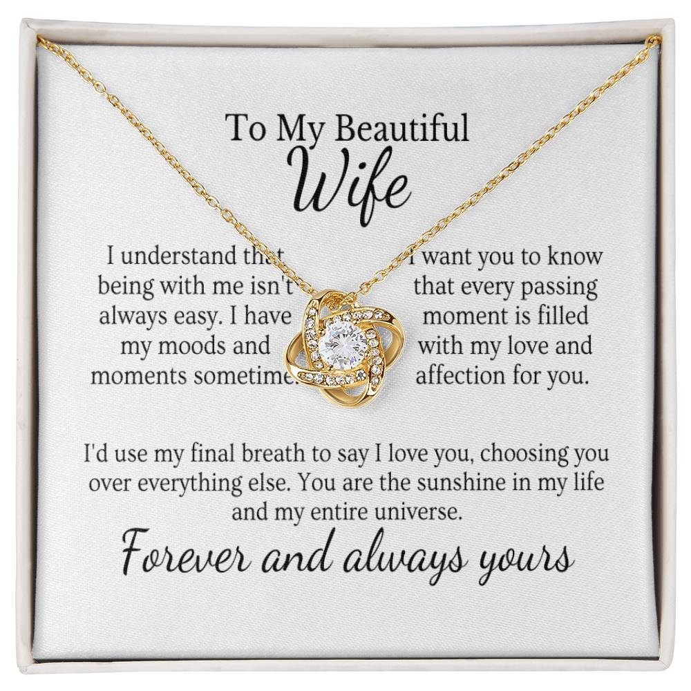 Husband's love necklace  Endless elegance jewelry  Queen's adornment necklace  Romantic gift for wife  Love-themed pendant  Stylish queen's accessory  Elegant love necklace  Sentimental jewelry for her  Symbolic love pendant  King and queen necklace  Timeless love-themed jewelry  Husband's special gift  Graceful love adornment  Royal elegance necklace  Meaningful queen's pendant