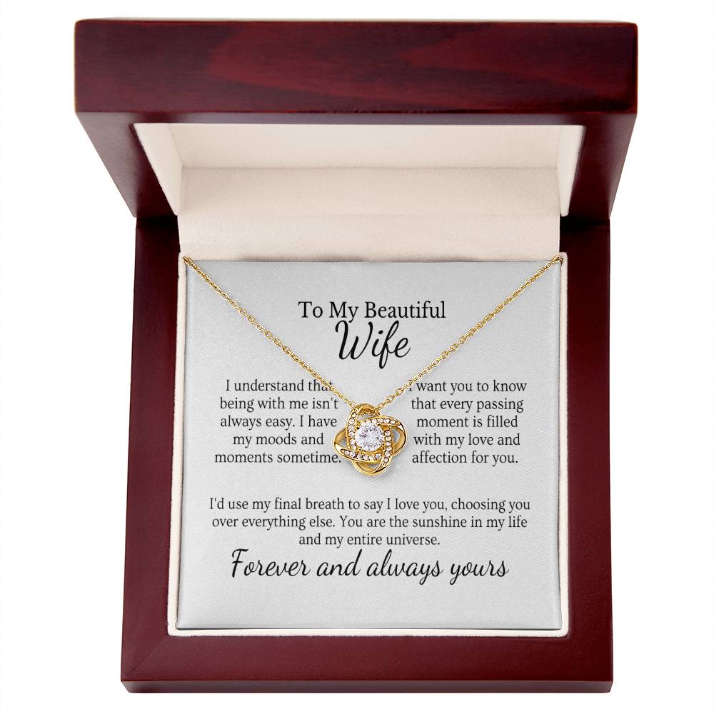 Husband's love necklace  Endless elegance jewelry  Queen's adornment necklace  Romantic gift for wife  Love-themed pendant  Stylish queen's accessory  Elegant love necklace  Sentimental jewelry for her  Symbolic love pendant  King and queen necklace  Timeless love-themed jewelry  Husband's special gift  Graceful love adornment  Royal elegance necklace  Meaningful queen's pendant