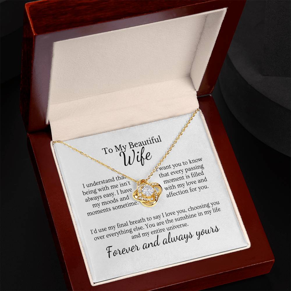 Husband's love necklace  Endless elegance jewelry  Queen's adornment necklace  Romantic gift for wife  Love-themed pendant  Stylish queen's accessory  Elegant love necklace  Sentimental jewelry for her  Symbolic love pendant  King and queen necklace  Timeless love-themed jewelry  Husband's special gift  Graceful love adornment  Royal elegance necklace  Meaningful queen's pendant