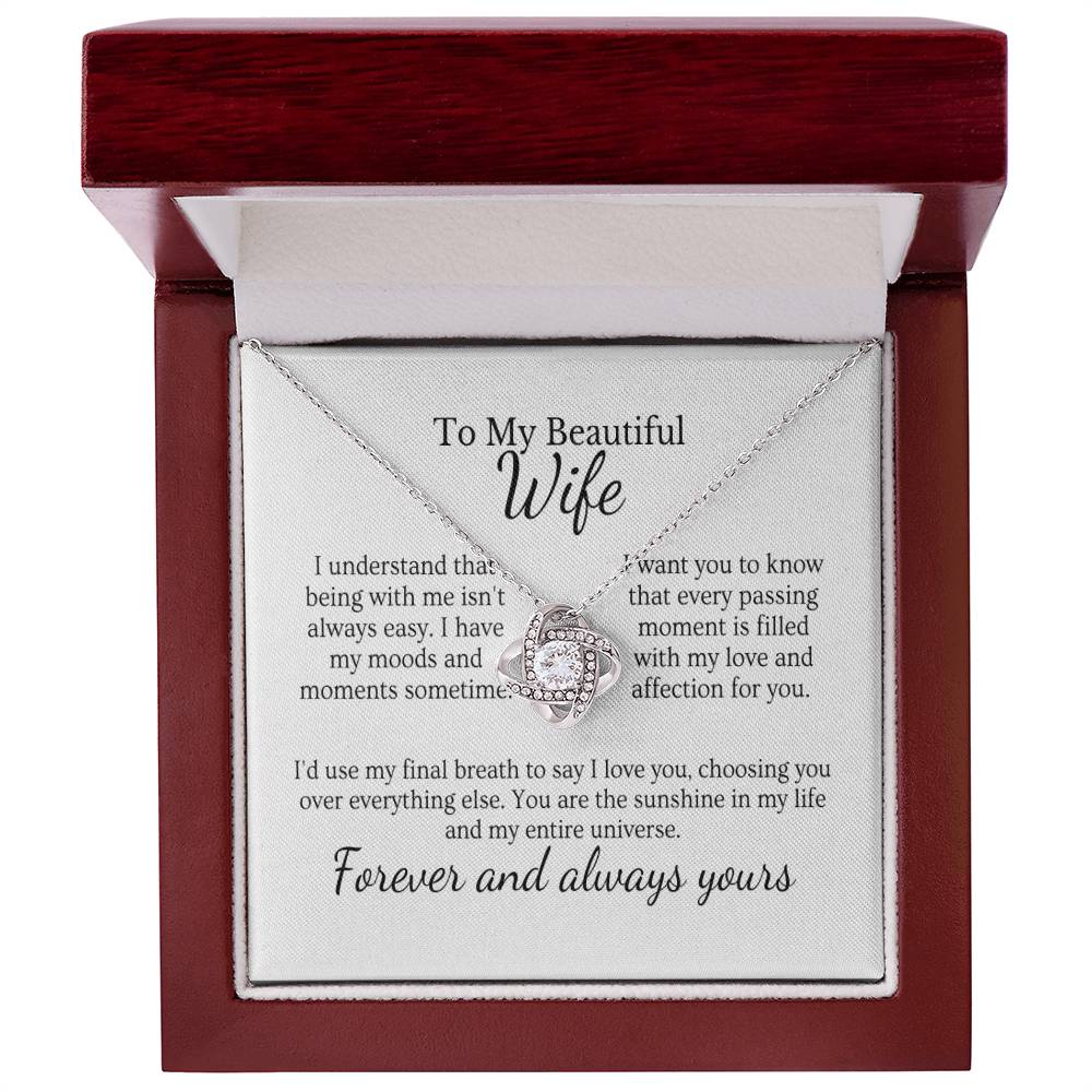 Husband's love necklace  Endless elegance jewelry  Queen's adornment necklace  Romantic gift for wife  Love-themed pendant  Stylish queen's accessory  Elegant love necklace  Sentimental jewelry for her  Symbolic love pendant  King and queen necklace  Timeless love-themed jewelry  Husband's special gift  Graceful love adornment  Royal elegance necklace  Meaningful queen's pendant