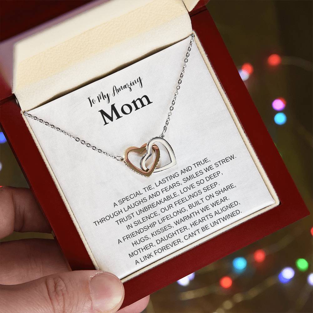 Mother-daughter necklace  Hearts aligned pendant  Sentimental gift for mom  Meaningful mother-daughter jewelry  Elegant love-themed accessory  Personalized necklace for mom  Mother's keepsake jewelry  Timeless love pendant  Cherished gift for mother  Daughter's affectionate jewelry  Unique love-themed necklace  Expressive mother-daughter accessory  Beloved mom's pendant  Intimate love-themed jewelry  Everlasting love necklace