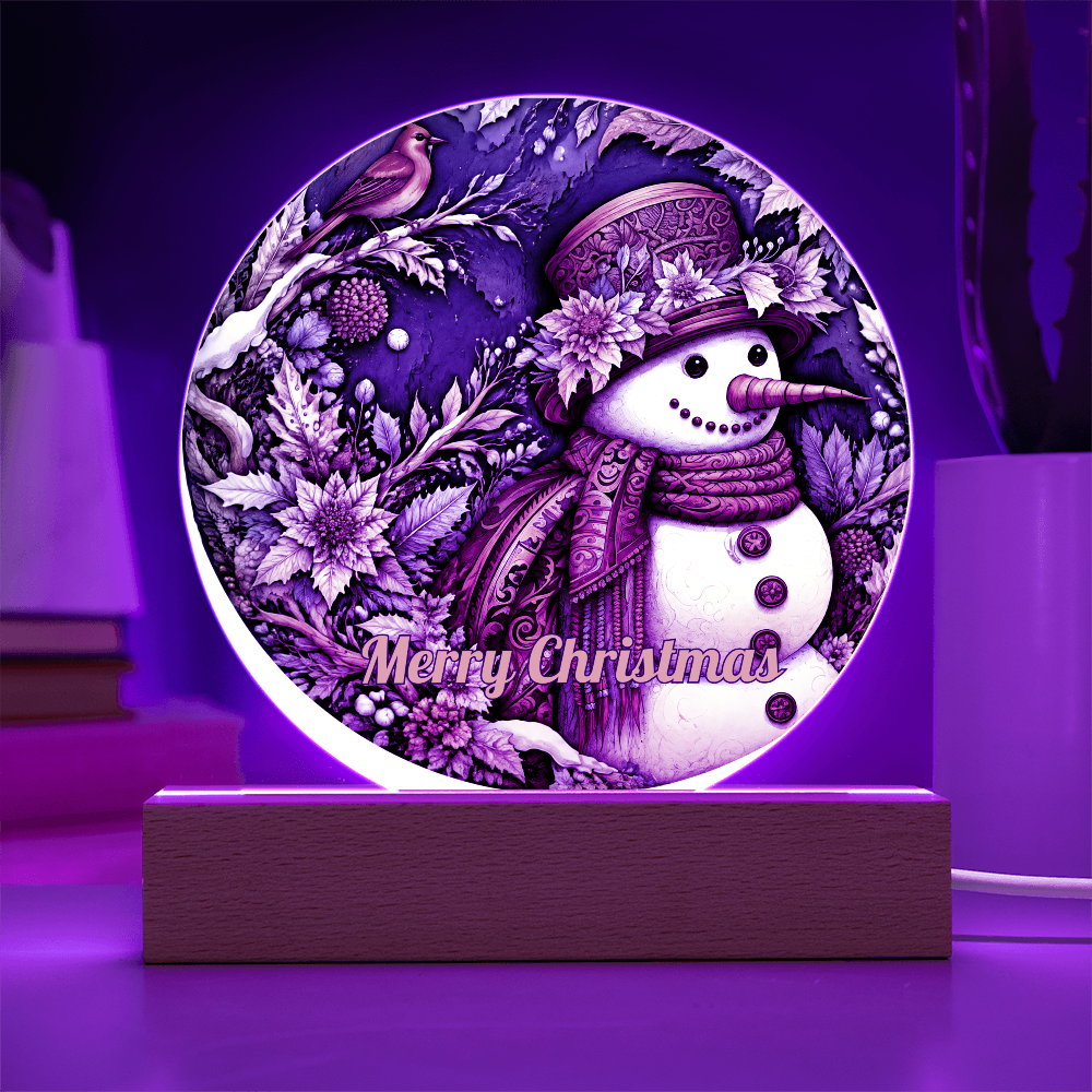 Illuminated round acrylic plaque featuring a vintage snowman and red robin glowing with purple light on a wooden base.