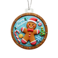 Round acrylic Christmas ornament in a stained-glass style featuring a smiling gingerbread man wearing a Santa hat, surrounded by holiday candies, a Christmas tree, and "Merry Christmas" written at the top, isolated on a plain white background.