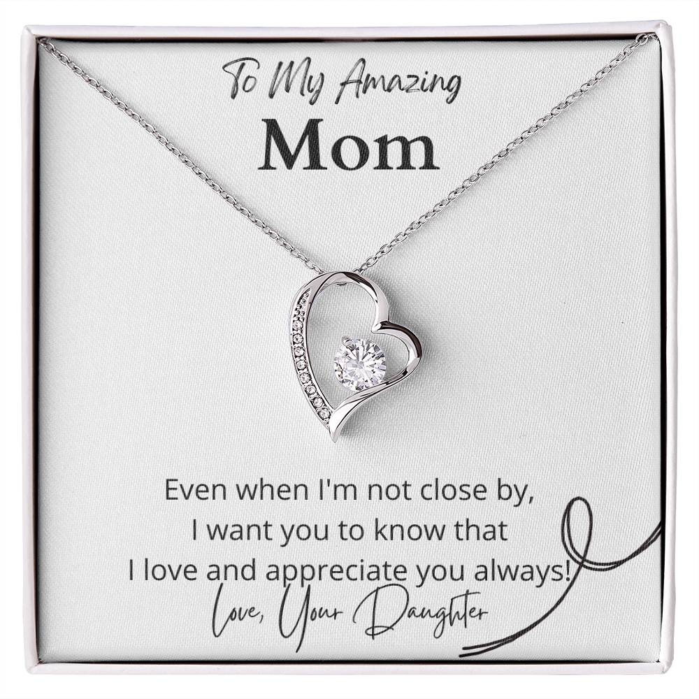 Emotional mother-daughter jewelry  Expressive love-themed necklace  Unique mom's keepsake  Cherished gift from daughter  Timeless love adornment  Mom's special pendant  Daughter's affectionate gift  Personalized mom's jewelry