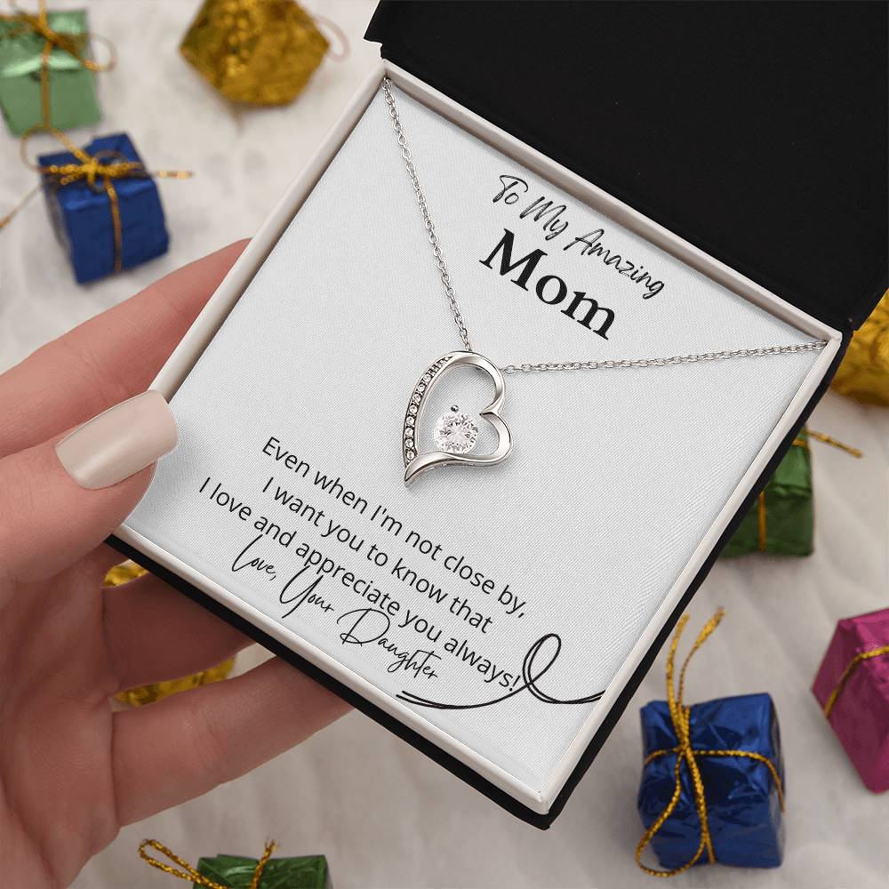 Emotional mother-daughter jewelry  Expressive love-themed necklace  Unique mom's keepsake  Cherished gift from daughter  Timeless love adornment  Mom's special pendant  Daughter's affectionate gift  Personalized mom's jewelry