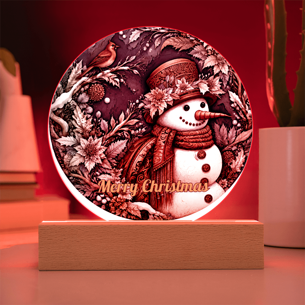 Round acrylic circle plaque featuring a vintage snowman and red robin with "Merry Christmas" text, glowing with warm light on a wooden base.