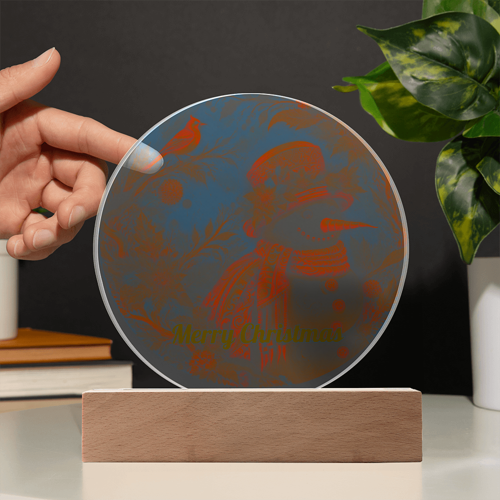 Hand placing a clear round acrylic plaque into a rectangular wooden LED light base.