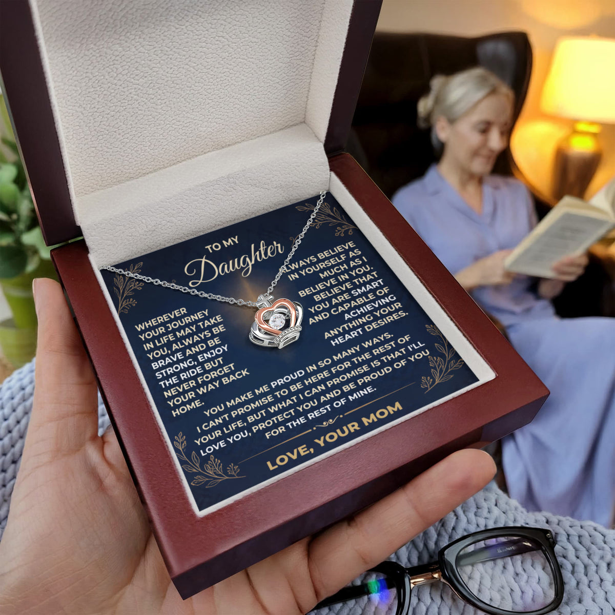 To My Daughter crown pendant necklace and personalized message card displayed in an illuminated luxury mahogany gift box by Giulia's Jems.