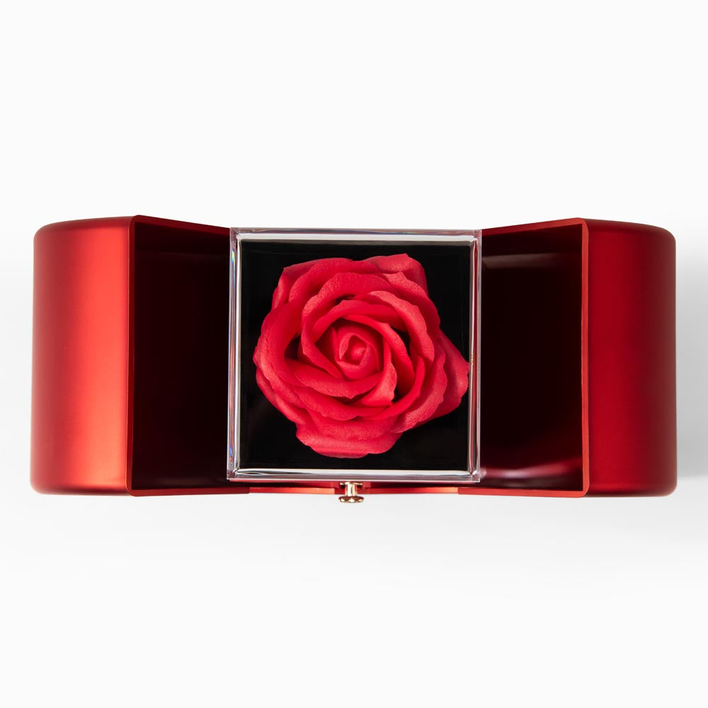 Red heart rose presentation box open to show a red soap rose inside.
